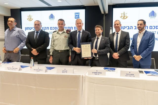  Finance Minister Bezalel Smotrich, Defense Minister Yoav Gallant and IDF Chief of Staff Herzi Halevi signing a multi-year plan for the IDF. (photo credit: IDF SPOKESPERSON'S UNIT)
