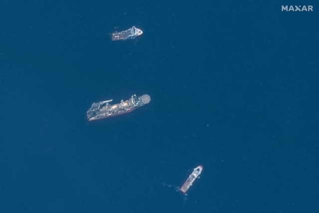 A satellite image shows ships taking part in the search and rescue operations associated with the missing Titan submersible near the wreck of the Titanic, June 22, 2023 (photo credit: MAXAR TECHNOLOGIES/HANDOUT VIA REUTERS)
