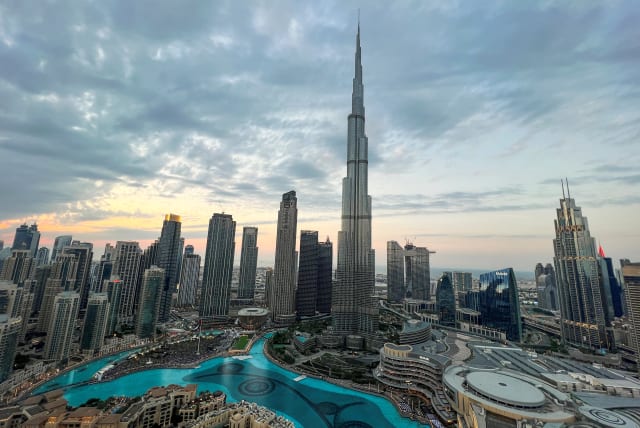  A general view of Dubai Downtown showing world's tallest building Burj Al Khalifa, in Dubai United Arab Emirates, December 31, 2022. (photo credit: REUTERS/Abdelhadi Ramahi)