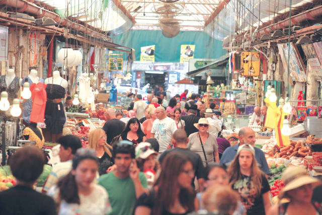  THE BUSTLING Mahaneh Yehuda market in Jerusalem turns 100.  (photo credit: Marc Israel Sellem/Jerusalem Post)
