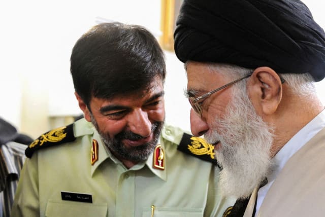 Iran's Supreme Leader Ayatollah Ali Khamenei meets with the new chief commander of the Iranian police force, Ahmad-Reza Radan in Tehran, Iran, in this picture obtained on January 7, 2023. (photo credit: Office of the Iranian Supreme Leader/WANA/Handout via Reuters)