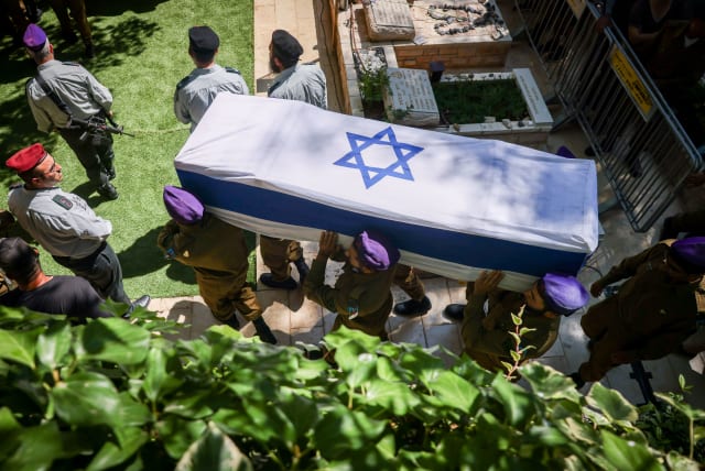  Thousands attend the funeral of Staff Sgt. Shilo Yosef Amir, killed in a shooting attack near Kedumim, at the Mount Herzl Military Cemetery in Jerusalem, on July 7, 2023. (photo credit: Chaim Goldberg/Flash90)