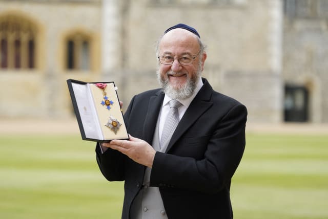  Chief Rabbi Sir Ephraim Mirvis after receiving his Knighthood for services to the Jewish Community, interfaith relations and education during an investiture ceremony at Windsor Castle, Berkshire. Picture date: Tuesday, July 11, 2023. (photo credit: Andrew Matthews/Pool via REUTERS)