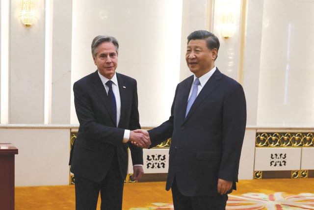  Chinese President Xi Jinping welcomes US Secretary of State Antony Blinken in the Great Hall of the People in Beijing, June 19.  (photo credit: Leah Mills/Reuters)