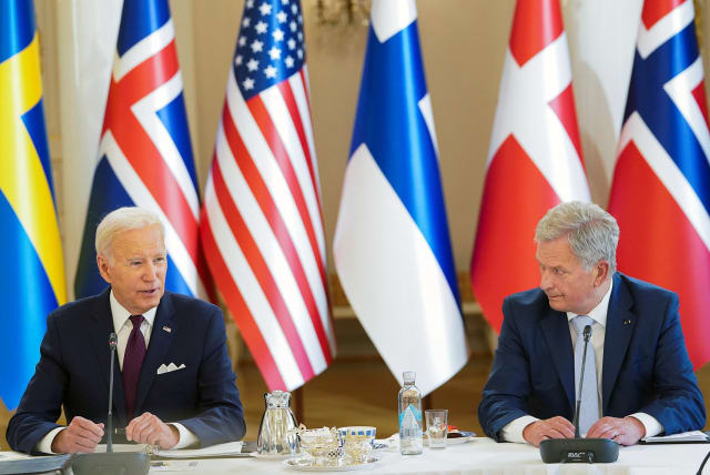  US President Joe Biden sits next to Finland's President Sauli Niinisto, during a US-Nordic Leaders meeting, in Helsinki, Finland, July 13, 2023.  (photo credit: REUTERS/KEVIN LAMARQUE)