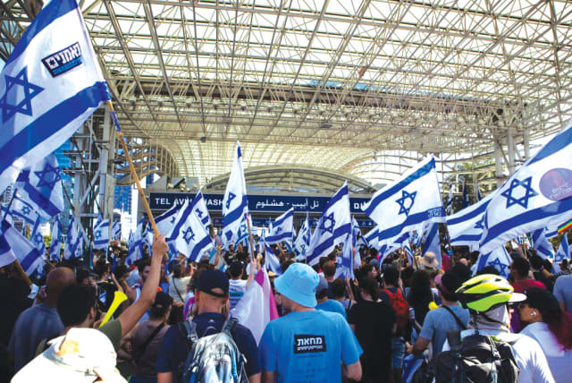  PROTESTERS CONVERGE on Tel Aviv’s Hashalom train station on Tuesday during the Day of Disruption against the judicial reform legislation (photo credit: I.H. Mintz)