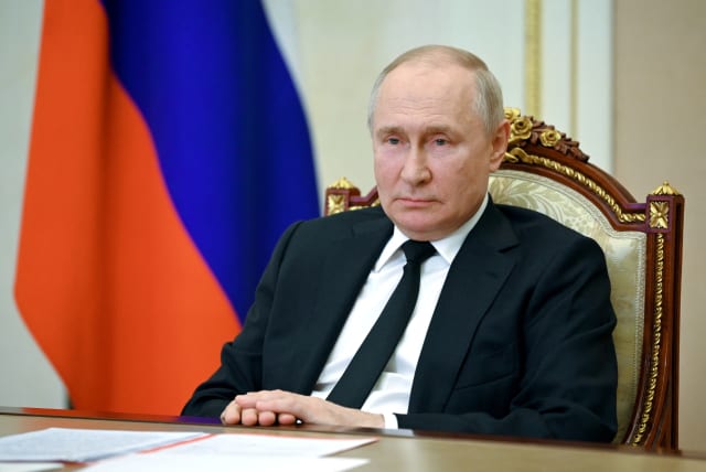  Russian President Vladimir Putin chairs a meeting of the Security Council via a video link in Moscow, Russia, July 21, 2023.  (photo credit: Sputnik/Alexander Kazakov/Kremlin via REUTERS)