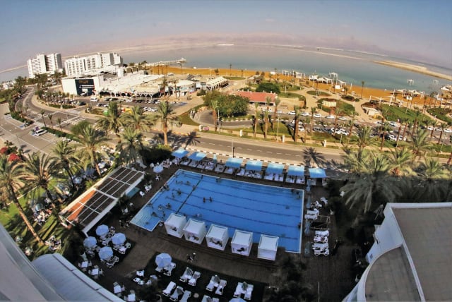  THE VIEW of the Noga hotel pool and the Dead Sea from each room is not a sight you will forget in a hurry. The colors of the landscape constantly change. (photo credit: ORI LEWIS)