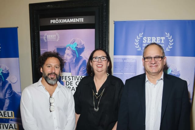  Israeli ambassador to Argentina with Patty Hochman co-director of “Seret” festival and director Ofir Raul Graizer  (photo credit: Embassy of israel in Argentina)