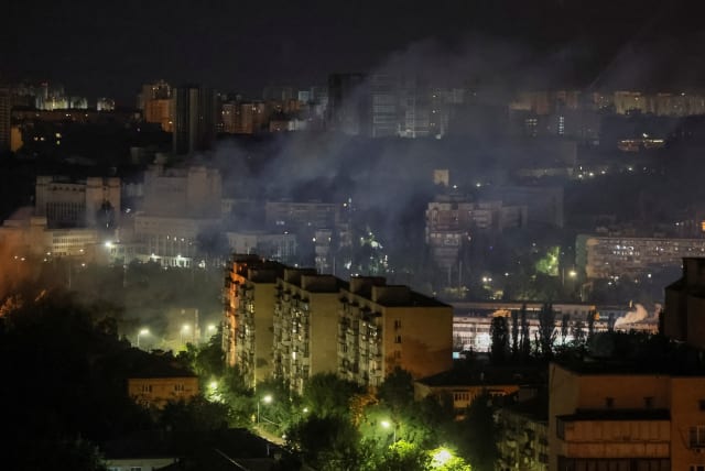  Smoke rises in the sky over the city after a Russian drone strike, amid Russia's attack on Ukraine, in Kyiv, Ukraine July 13, 2023. (photo credit: GLEB GARANICH/REUTERS)