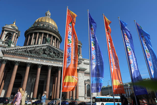 Flags informing of the upcoming Russia-Africa summit fly in front of Saint Isaac's Cathedral in central Saint Petersburg, Russia, July 25, 2023. (photo credit: ANTON VAGANOV/ REUTERS)
