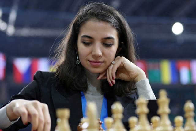 Sara Khadem of Iran plays against Olga Girya of Russia. (photo credit: PAVEL MIKHEYEV/REUTERS)
