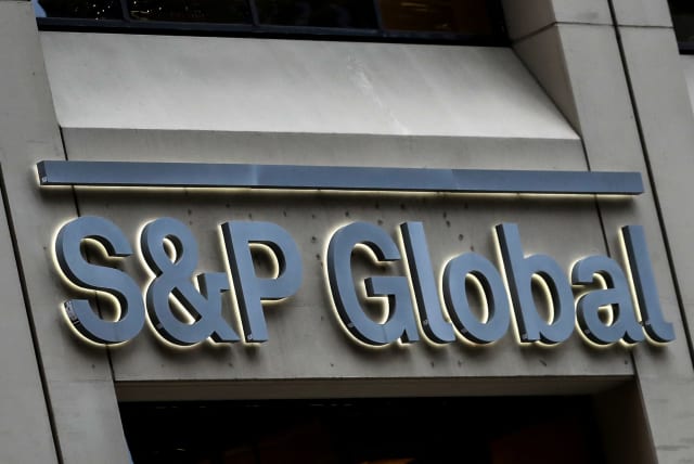  The S&P Global logo is displayed on its offices in the financial district in New York City, US, December 13, 2018 (photo credit: REUTERS)