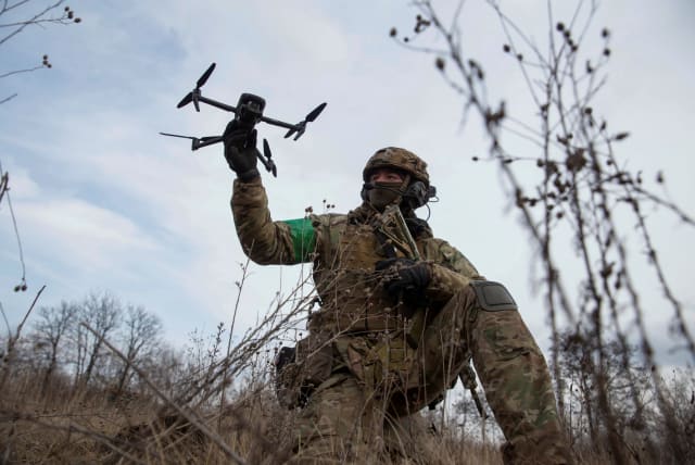  A Ukrainian serviceman practices to use a drone, amid Russia's attack on Ukraine, near the town of Chasiv Yar, Donetsk region, Ukraine March 8, 2023 (photo credit: Oleksandr Ratushniak/Reuters)