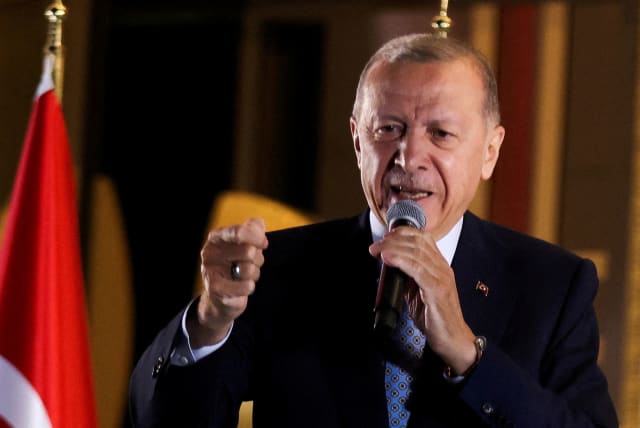  Turkish President Tayyip Erdogan addresses supporters at the Presidential Palace after his victory in the second round of the presidential election, Ankara, Turkey, May 29, 2023. (photo credit: REUTERS/UMIT BEKTAS)