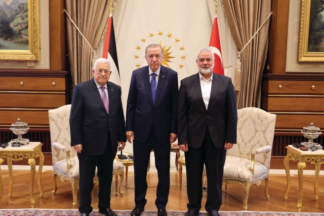  TURKEY’S PRESIDENT Recep Tayyip Erdogan meets with Palestinian Authority head Mahmoud Abbas and Hamas leader Ismail Haniyeh at the Presidential Palace in Ankara, last Wednesday.  (photo credit: Palestinian President’s Office/Reuters)