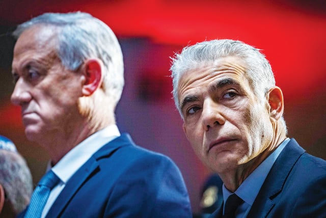  BENNY GANTZ and Yair Lapid should consider entering a national-unity government, says the writer.  (photo credit: OLIVIER FITOUSSI/FLASH90)
