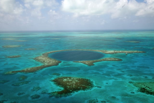  The Great Blue Hole off the coast of Belize. (photo credit: Wikimedia Commons)