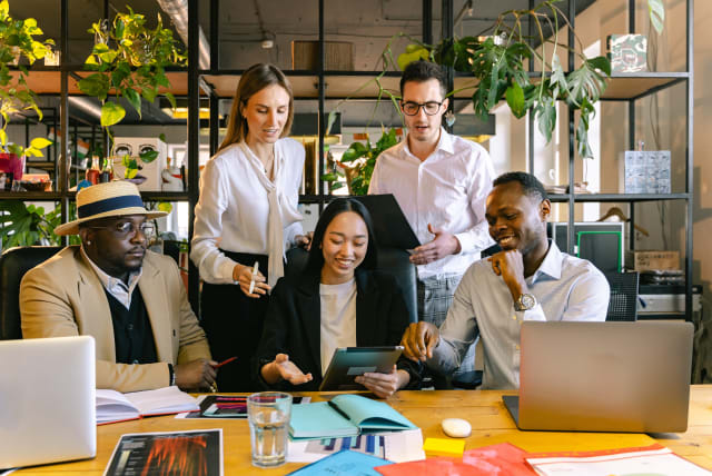  Illustrative image of people in an office. (photo credit: PEXELS)