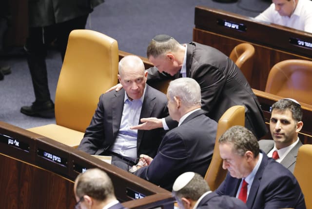  YULI EDELSTEIN talks to Defense Minister Yoav Gallant as Prime Minister Benjamin Netanyahu looks on during the Knesset vote on the reasonableness standard last week.  (photo credit: MARC ISRAEL SELLEM/THE JERUSALEM POST)