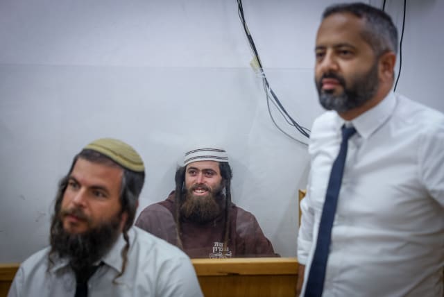  Elisha Yered, an Israeli settler suspected of being involved in the death of a Palestinian teenager, is seen at the Jerusalem Magistrate's Court, on August 5, 2023. (photo credit: CHAIM GOLDBEG/FLASH90)