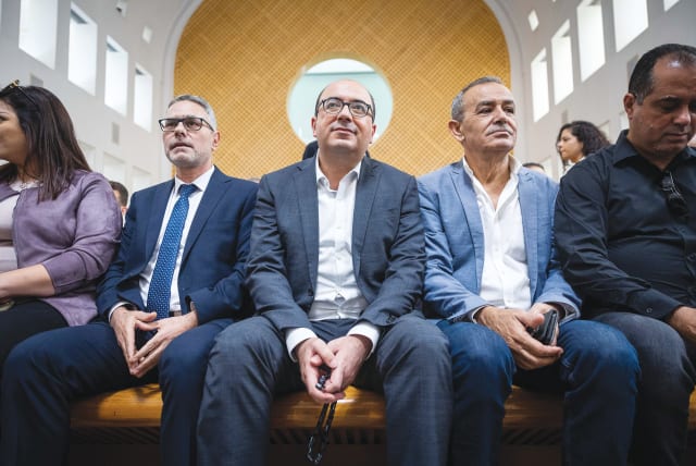  THEN-MK SAMI Abu Shehadeh (center), head of Balad, and other party members attend a Supreme Court hearing in Jerusalem on the Central Elections Committee’s decision to disqualify Balad from running in the upcoming Knesset election, last year. (photo credit: YONATAN SINDEL/FLASH90)