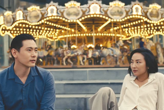  TEO YOO (left) as Jung Hae Sung, and Greta Lee as Nora in ‘Past Lives.’ (photo credit: Courtesy Lev Cinema)