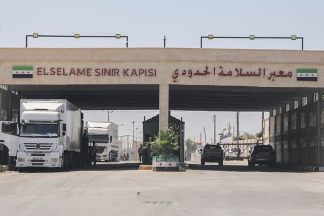  Cars are seen at the border crossing of Bab al-Salameh in Aleppo countryside, Syria August 9, 2023 (photo credit: REUTERS/MAHMOUD HASSANO)