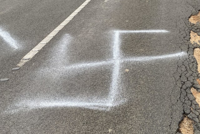A swastika was painted onto a busy road in Australia. (photo credit: ANTI-DEFAMATION COMMISSION)