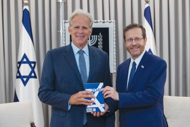  PRESIDENT ISAAC HERZOG receives from Michael Oren his visionary book ‘2048: The Rejuvenated State.’ (photo credit: Todd Rosenblatt Photography)