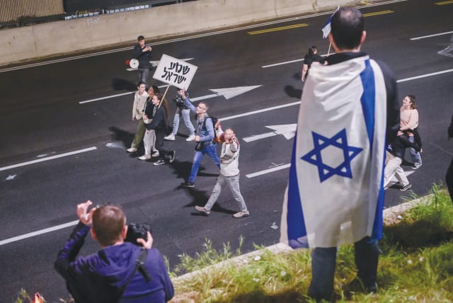  DIRECTLY AFTER the pandemic, Israelis returned to the street even more strongly, all the way down to the blocked Ayalon highway, says the writer. (photo credit: AVSHALOM SASSONI/FLASH90)