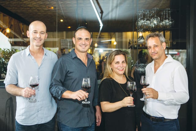  A TOAST and a taste of new wines in the Barkan Altitude series. (From left:) Ido Lewinson, Olivier Prati, Lee Boldes, and Nir Gil. (photo credit: LIOR GOLSAD)