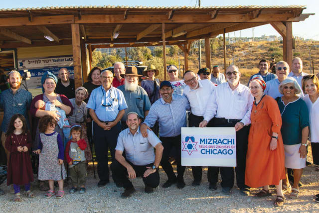  THE DELEGATION of Religious Zionists of Chicago at an IDF camp in Itamar.  (photo credit: Courtesy Stewart Weiss)