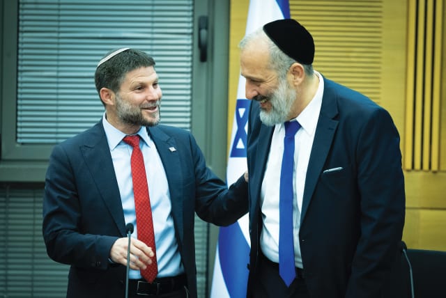  FINANCE MINISTER Bezalel Smotrich, leader of the Religious Zionist Party, and Shas party head MK Arye Deri attend a meeting in the Knesset in May on the state budget.  (photo credit: YONATAN SINDEL/FLASH90)