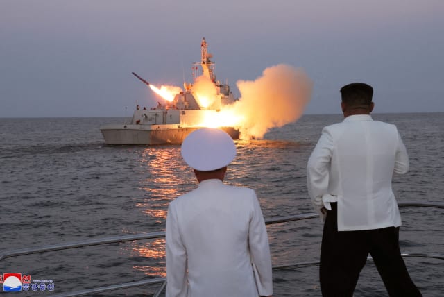  North Korean leader Kim Jong Un oversees a strategic cruise missile test aboard a navy warship in this undated photo released by North Korea's Korean Central News Agency (KCNA) on August 21, 2023.  (photo credit: REUTERS)