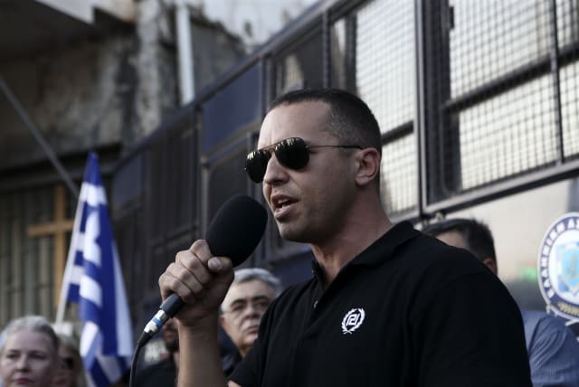  Then-Golden Dawn lawmaker Ilias Kasidiaris speaks during a rally against the construction of a mosque in central Athens, Sept. 5, 2018.  (photo credit: Panayotis Tzamaros/NurPhoto/Getty Images)
