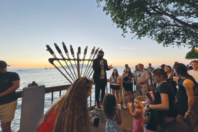  CHABAD OF Maui holds a Hanukkah gathering in Lahaina, this past year. (photo credit: Chabad of Maui)