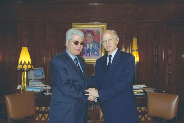  THEN-FOREIGN MINISTER David Levy (left) meets with André Azoulay, the adviser of the Moroccan king, in 2000. (photo credit: Moshe Milner/GPO)