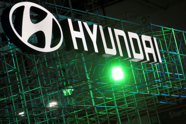  Hyundai logo is seen during Munich Auto Show, IAA Mobility 2021 in Munich, Germany, September 8, 2021 (photo credit: WOLFGANG RATTAY / REUTERS)
