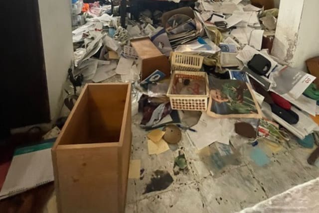  A Holocaust survivor's ransacked home is seen in this edited photo after robbers invaded. (photo credit: NOAM ATIA)