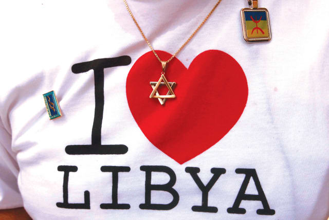 A STAR of David rests against a T-shirt worn by a Libyan-born Jew during a visit to Tripoli after the fall of Muammar Gaddafi in 2011. (photo credit: SUHAIB SALEM/REUTERS)