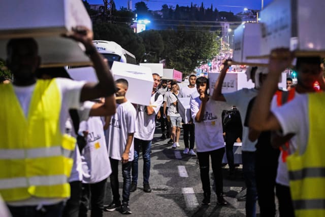  Members of the Arab community march as they protest against the violence in their community, in the northern Israeli city of Haifa, August 31, 2023 (photo credit: FLASH90)
