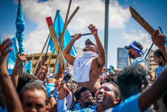  Eritrean asylum seekers who oppose the regime in Eritrea protest outside a conference of regime supporters in south Tel Aviv, September 2, 2023 (photo credit: ITAI RON/FLASH90)