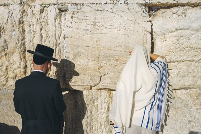  JEWS PRAY at the Western Wall. The creation of the State of Israel is one of the great religious redemptive events of Jewish history, states the writer.  (photo credit: Chaim Goldberg/Flash90)