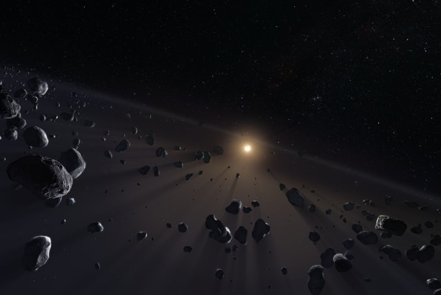 Artwork showing a section of Kuiper Belt, crowded with the icy cores of potential comets. (photo credit: ESO/M. Kornmesser/Flickr)