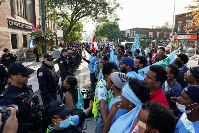  Toronto police work at the scene of a protest held by Eritrean anti-government protestors outside a pro-government event in Toronto, Ontario, Canada September 2, 2023. (photo credit: REUTERS)