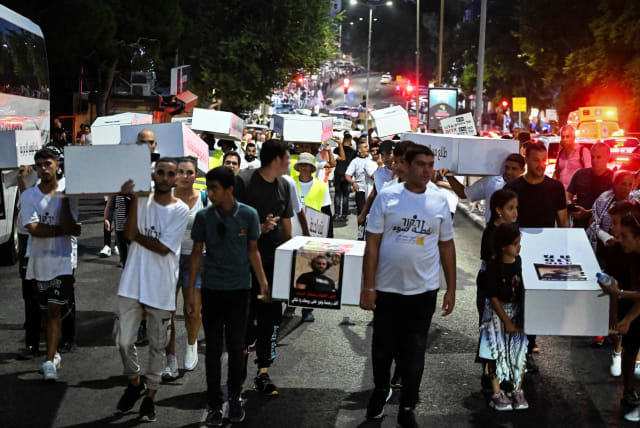  Members of the Arab community march as they protest against the violence in their community, in the northern Israeli city of Haifa. August 31, 2023 (photo credit: FLASH90)