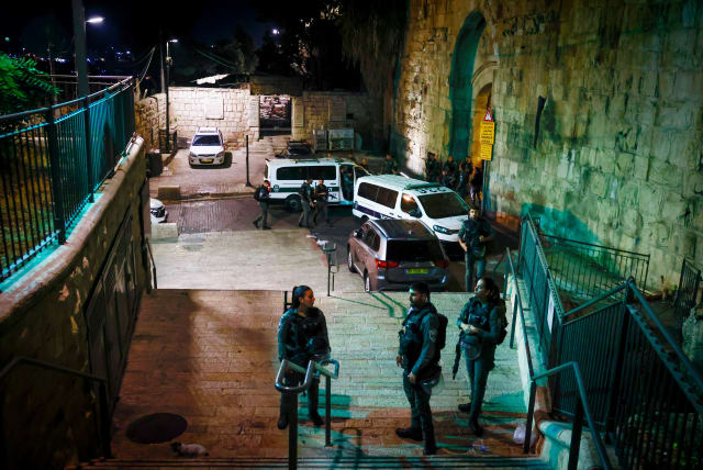  Police near the scene of an attempted stabbing attack at the Lion's gate in Jerusalem's Old City. September 4, 2023 (photo credit: Chaim Goldberg/Flash90)