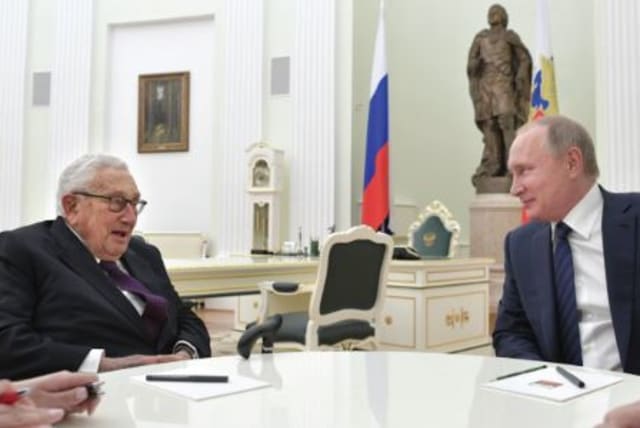  RUSSIAN PRESIDENT Vladimir Putin (R) meets with former US secretary of state Henry Kissinger at the Kremlin in Moscow, 2017. (photo credit: SPUTNIK/ALEXEI DRUZHININ/KREMLIN VIA REUTERS)