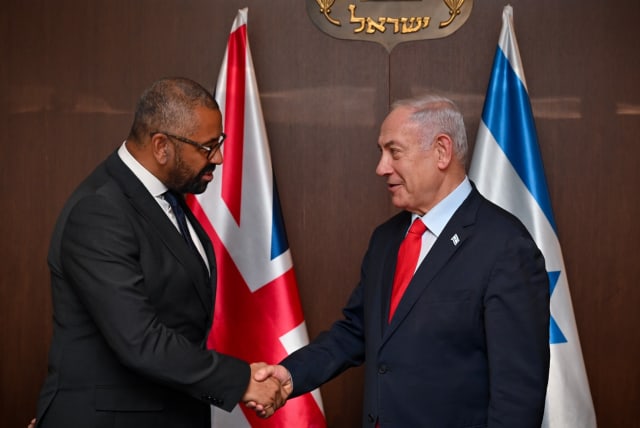 British Foreign Secretary James Cleverly and Israeli Prime Minister Benjamin Netanyahu shake hands, September, 2023. (photo credit: KOBI GIDEON/GPO)